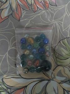 Bag of colorful glass marbles