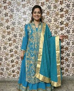 Elegant Teal Kurta Set with Gold Embroidery