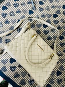 lino perros Cream Handbag