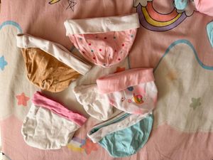 baby mittens,caps, and socks. 7 pairs