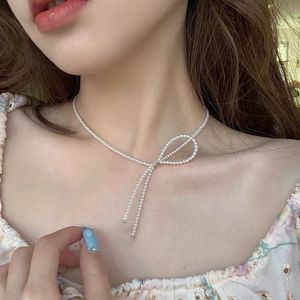 Delicate Bow Pearl Necklace
