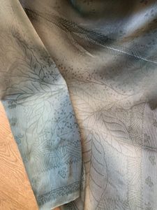 Shaded Shimmering Georgette Saree In Self Print