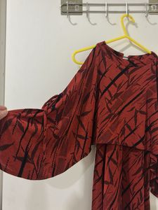 Rust cold shoulder pattern top