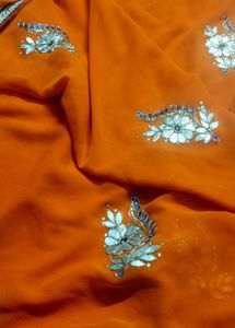 Vibrant Orange Embroidered Saree
