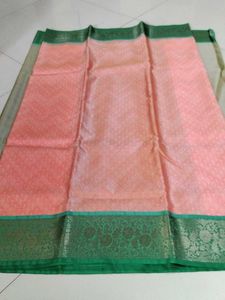 Elite orange green saree...