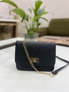 Chic Black Crossbody Bag with Chain Detail