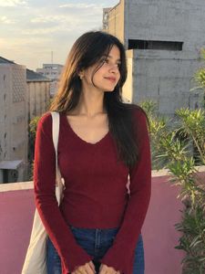 Maroon ribbed V-neck long sleeve top