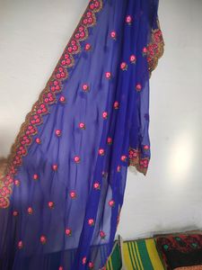 Blue Saree With Flowers Design