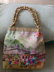 Unique Beaded Handle Clutch Bag
