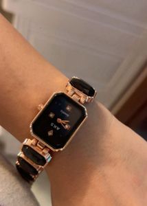 Elegant Gold Watch with Black Accents
