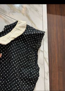 black polka dot mini dress
