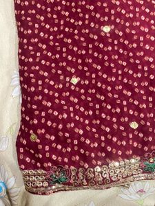Maroon Bandhani Saree with Gold Border