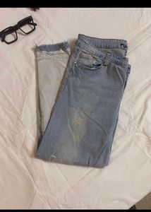Distressed Light Wash Denim Jeans