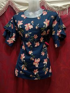 It Is Jean Top With Blue Floral Design.