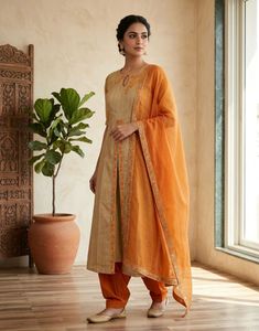 Orange lehnga with Embroidered Blouse
