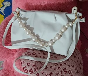 Material: PU    No. of Compartments: 1     Pattern: Printed     Net Quantity (N): 1     Sizes:Free Size (Length Size: 9 in, Width Size: 5 in, Height Size: 6 in).   Country of Origin: India
