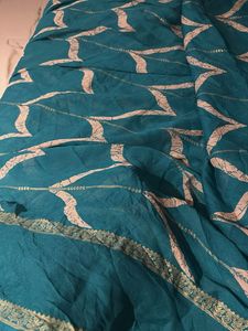 Teal saree with leaf design