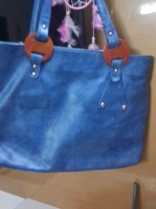 Stylish Blue Tote Bag with Wooden Accents