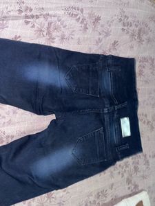 Dark Wash Flare Jeans with Embellishments