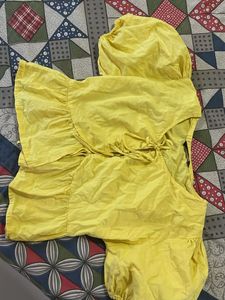 yellow Tie-Up Peplum Top