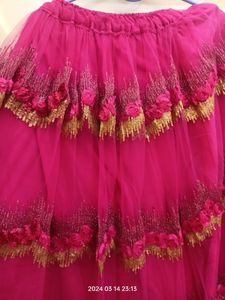 golden choli and dark pink ghaghra with duppatta