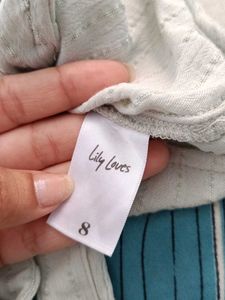 Light Blue Sleeveless Collared Shirt