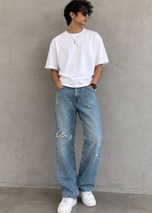 Distressed Blue Denim Jeans