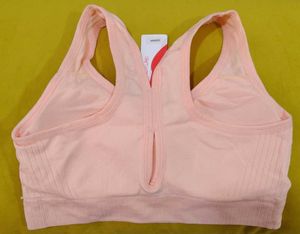 261 -- pitch Sports Bra with Rhinestone Logo