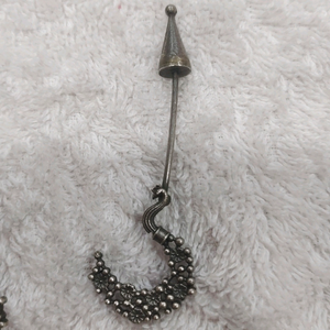 unique  silver look alike earing