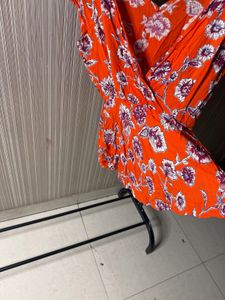 Chic Orange Floral Romper