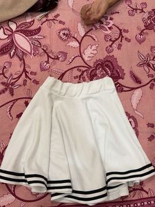 White Pleated Skirt with Black Stripes