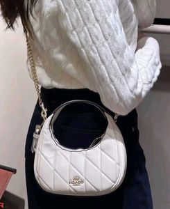 COACH* *CARMEN MINI CROSSBODY BAG IN QUILTED LEATH
