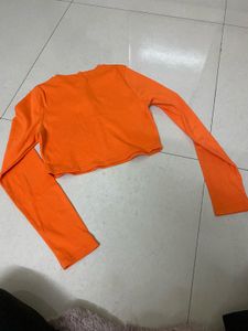 Bright Orange Cropped Top with Flower Detail