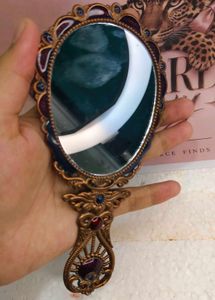 Vintage Peacock Mirror and Comb Set