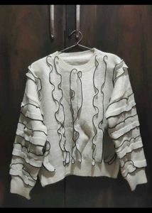 Ruffled White Knit Sweater