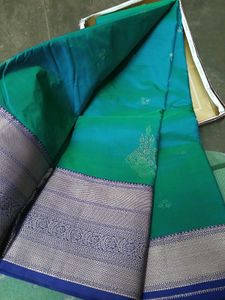 Elegant Teal Saree with Silver Zari Border