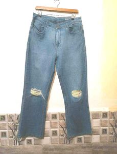 Distressed Blue Denim Jeans