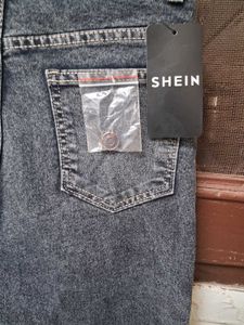 branded buttoned jeans