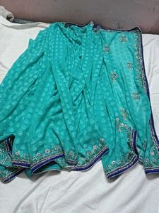 Stunning Teal Saree with Embellished Blouse