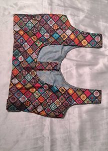 multi colour sleeveless blouse