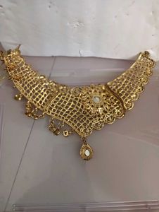 necklace, earing and 1 mang tika