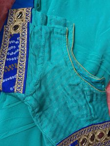 Stunning Teal Saree with Gold Border