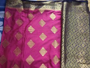 Elegant Pink Saree with Gold Diamond Motifs