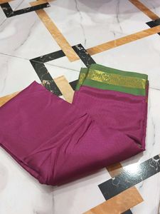 Elegant Pink Saree with Gold Border