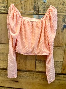 pink ruffled long sleeve crop top