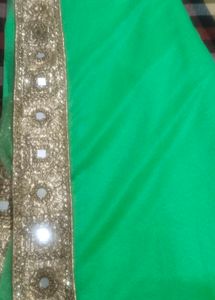 Vibrant Green Blouse with Golden Embellishments