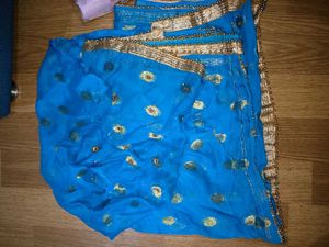 Beautiful Blue Saree with Gold Embellishments