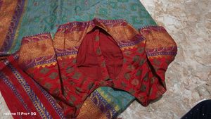 Exquisite Teal Saree with Red Blouse
