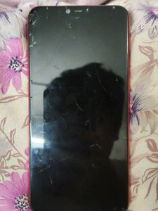 Red Smartphone with Cracked Screen