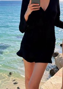 Chic Black Ruffled Mini Dress with tags